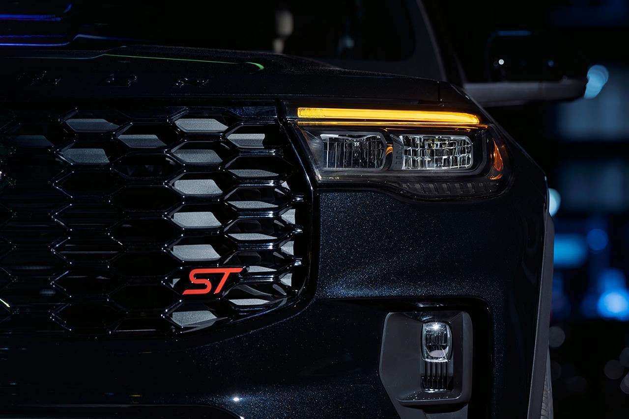 Close-up of the 2027 Ford Explorer ST Sinister Package grille and headlight.